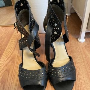 Black-gold studded stilettos